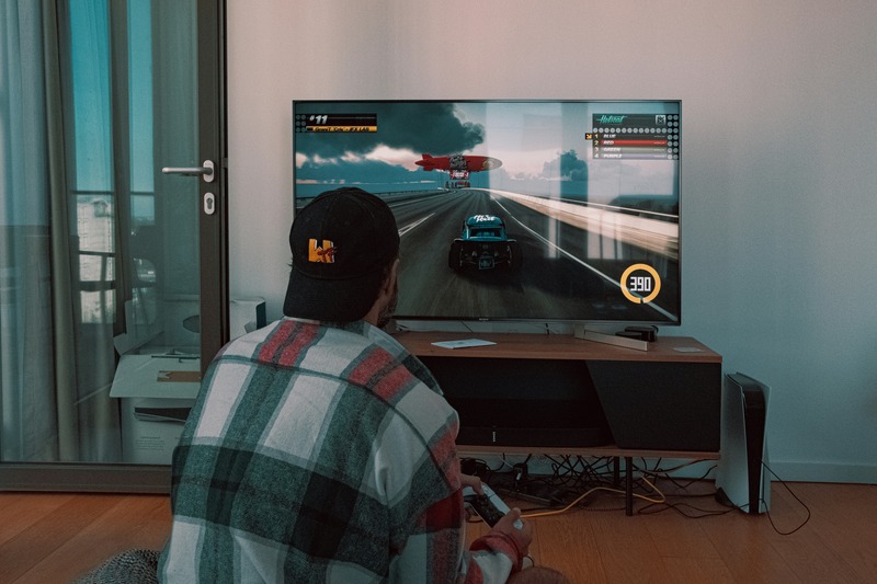 Person playing a video game on a console