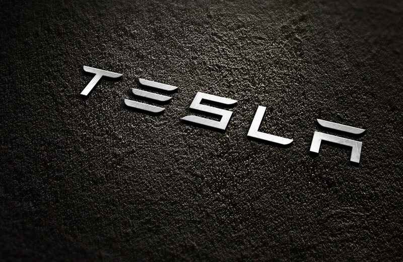 Tesla Logo with Abstract Background